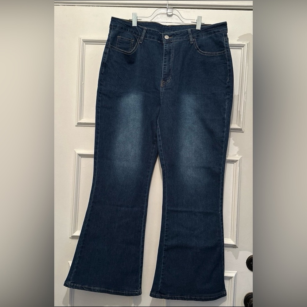 Blue jeans with flare. Size 2XL. Fits like 18-20P. Never worn. No rips or tears.